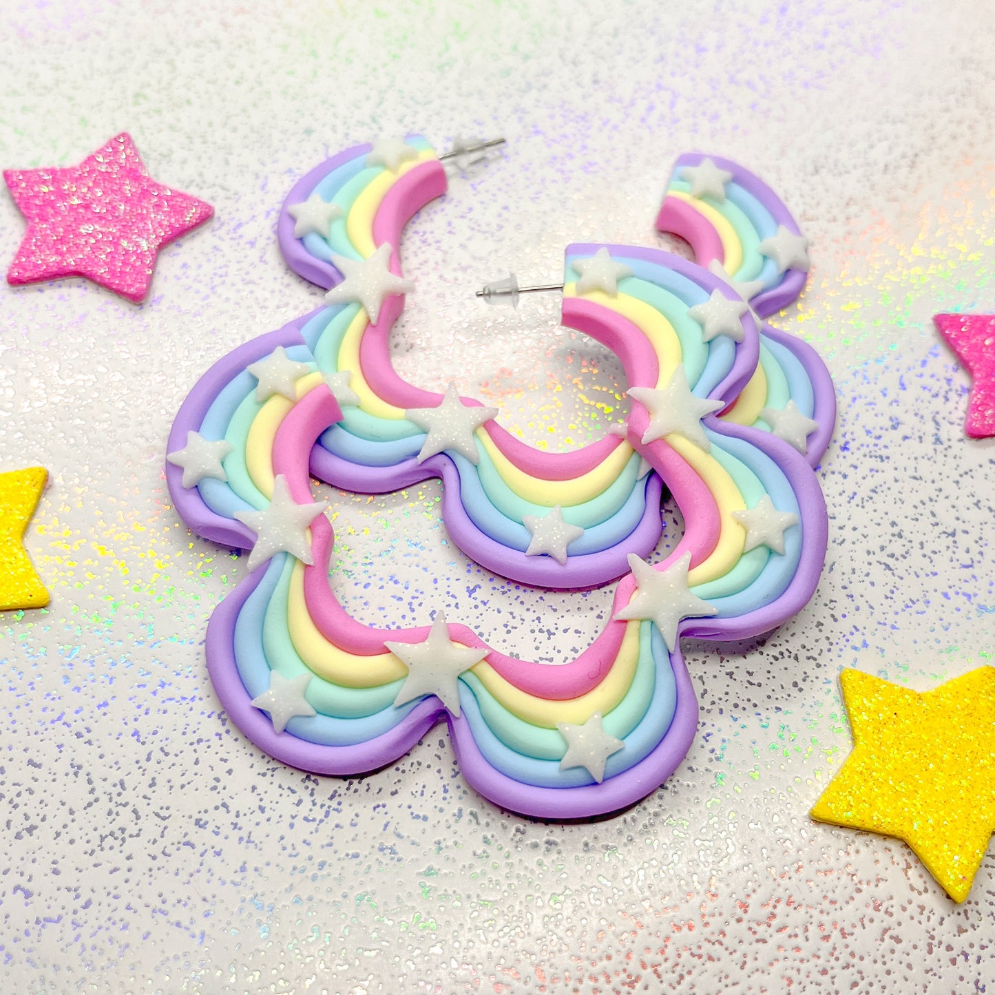 Pastel rainbow squiggle hoops with white glitter stars