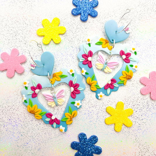 Blue ombre flower and butterfly scalloped hearts