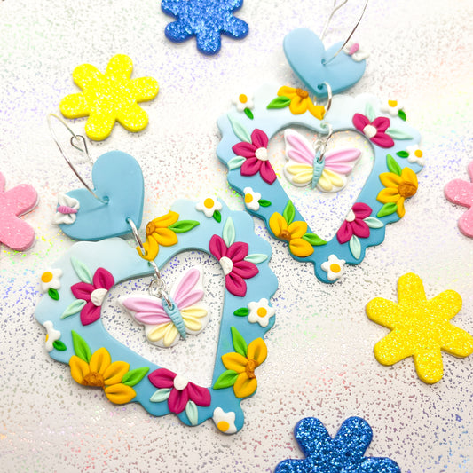 Blue ombre flower and butterfly scalloped hearts