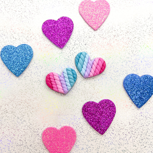 Blue to pink ombre twisted heart studs