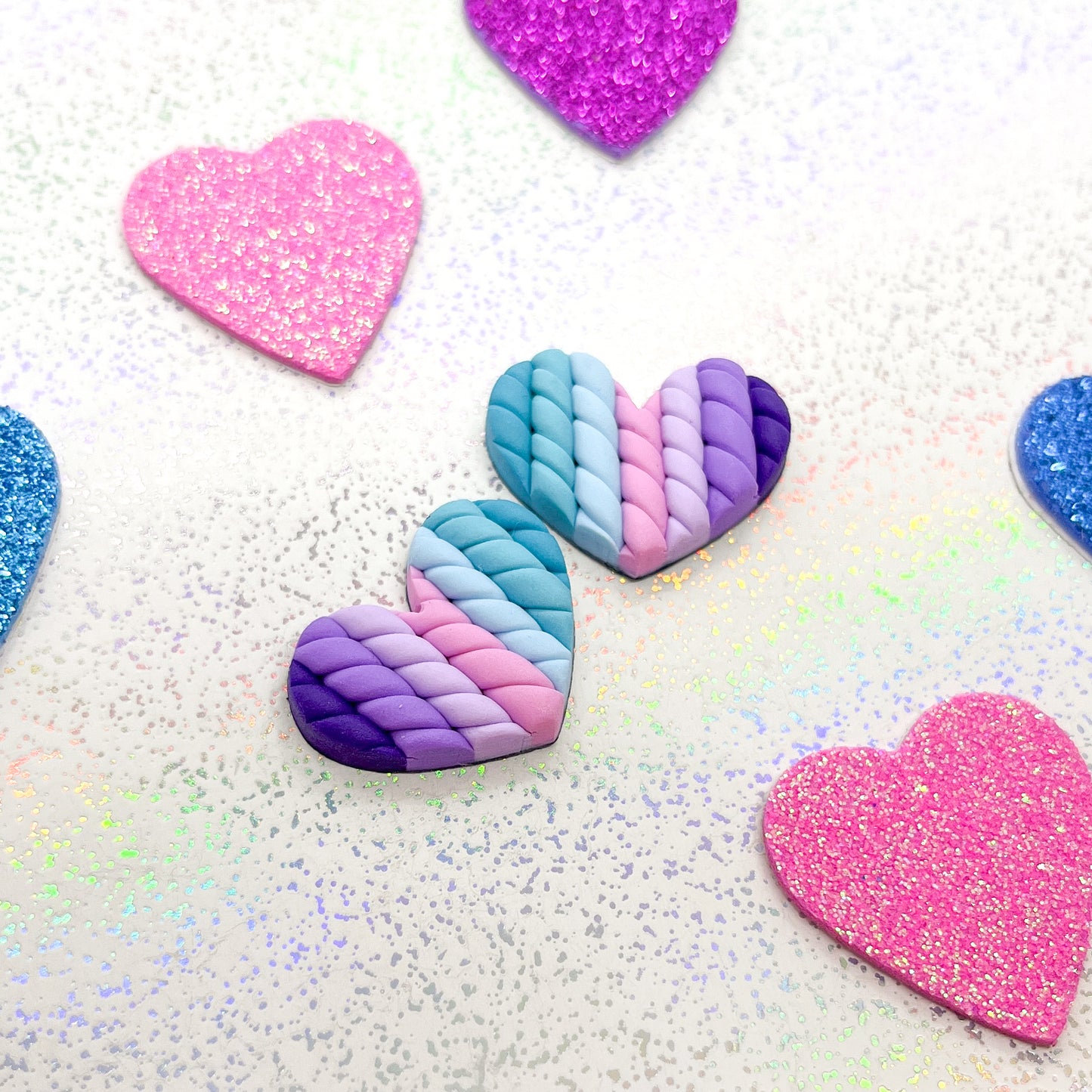 Blue to purple ombre twisted heart studs