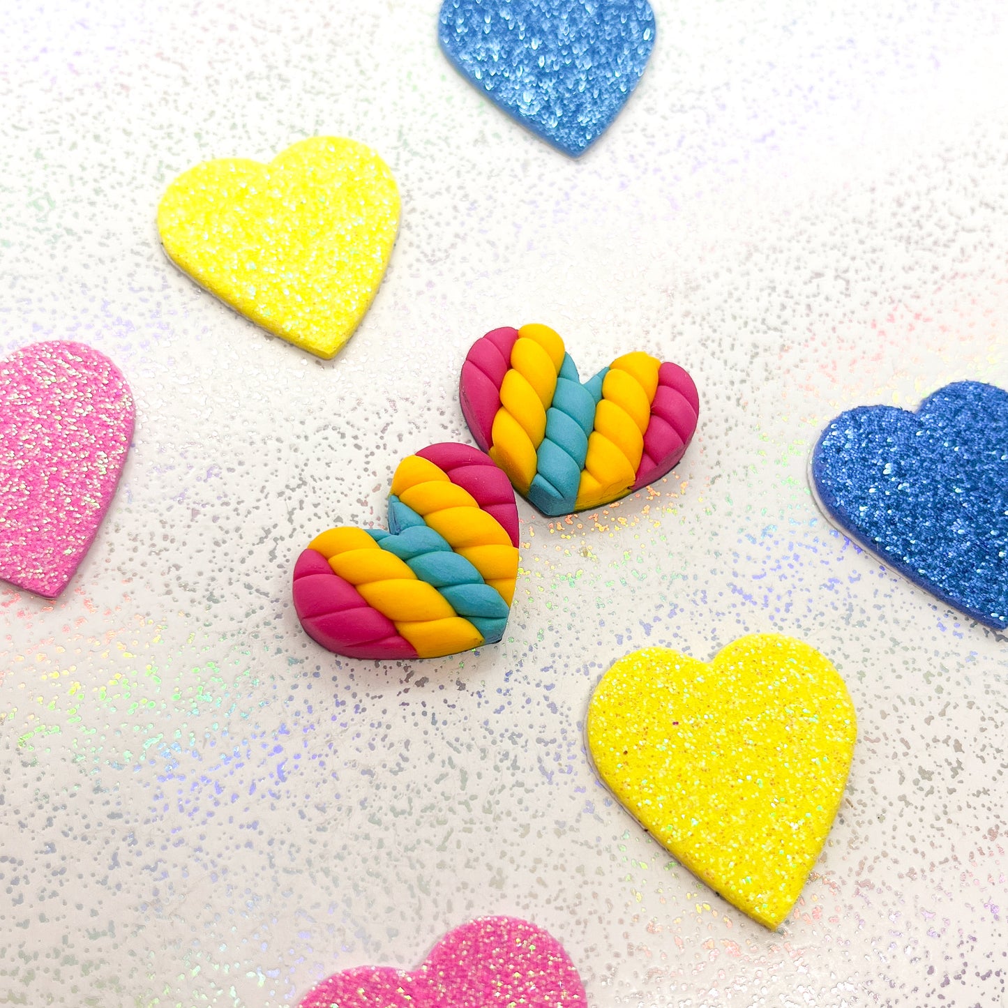 Pansexual flag twisted heart studs