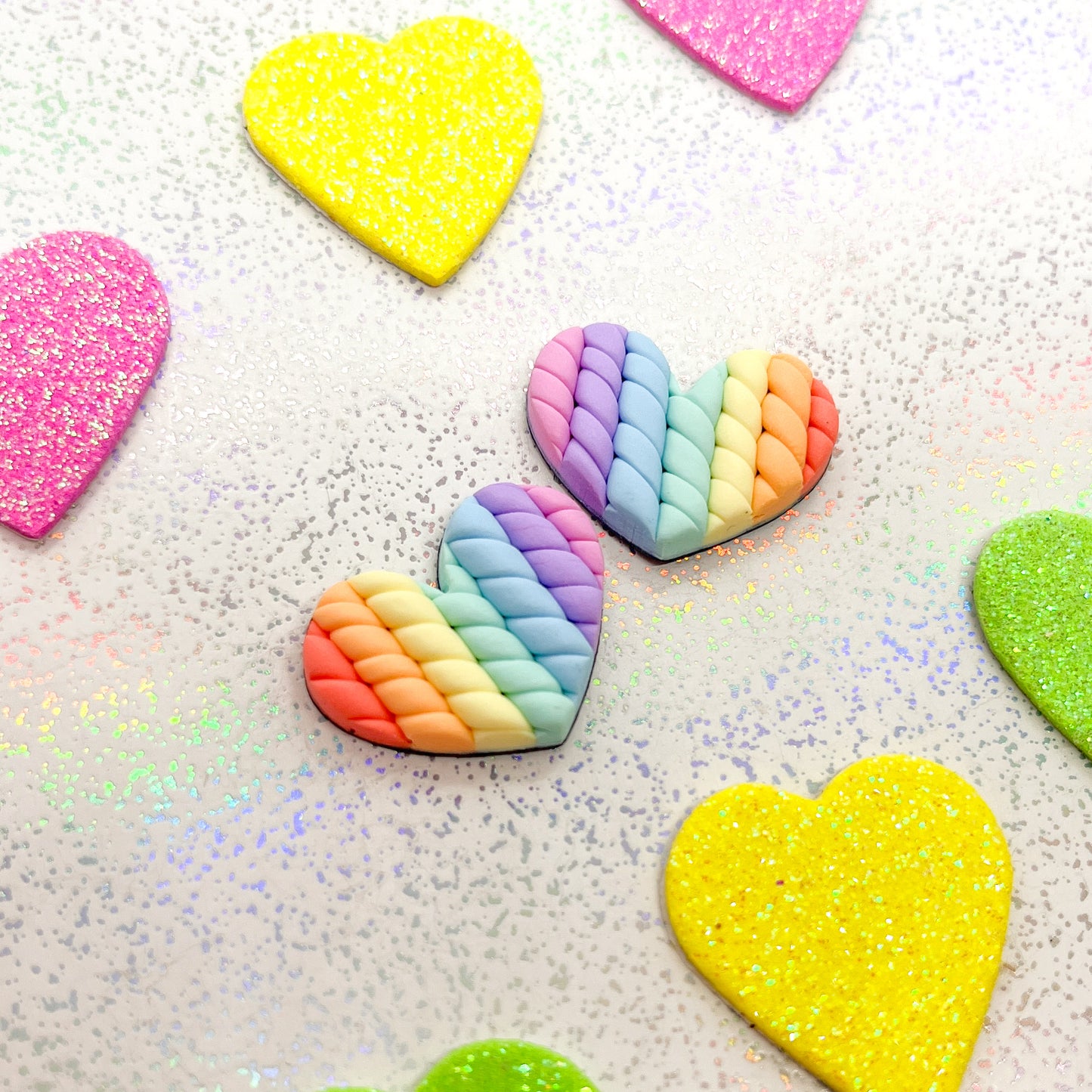 Pastel rainbow twisted heart studs