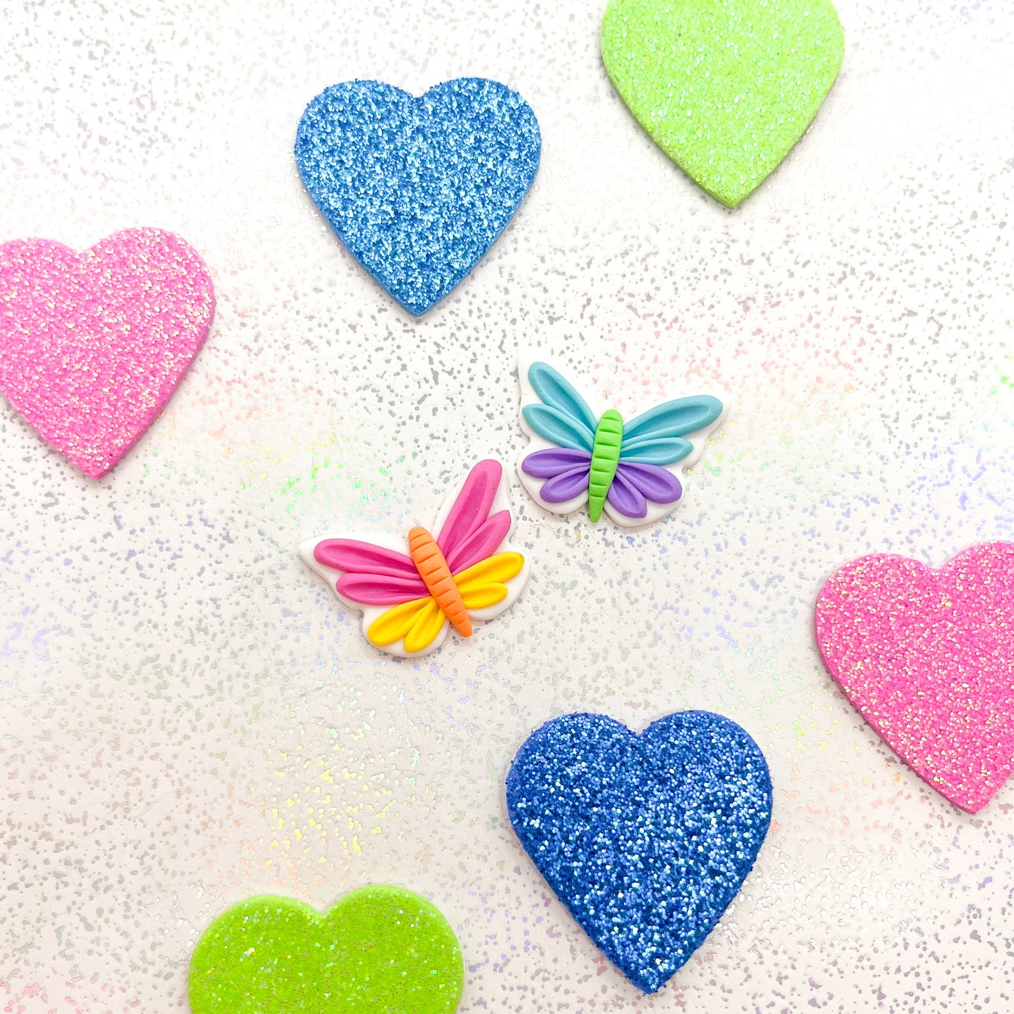 Mismatched rainbow butterfly studs