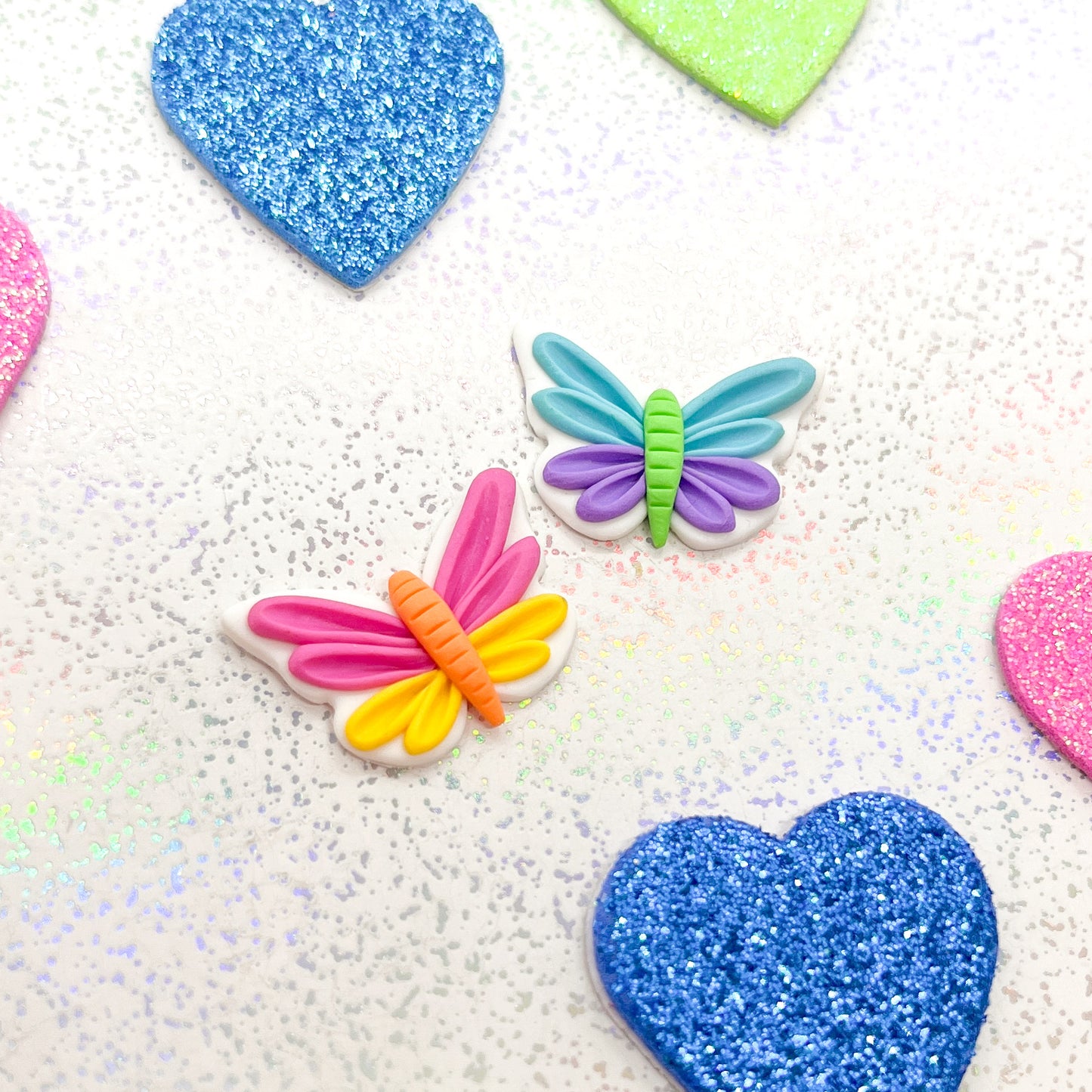 Mismatched rainbow butterfly studs