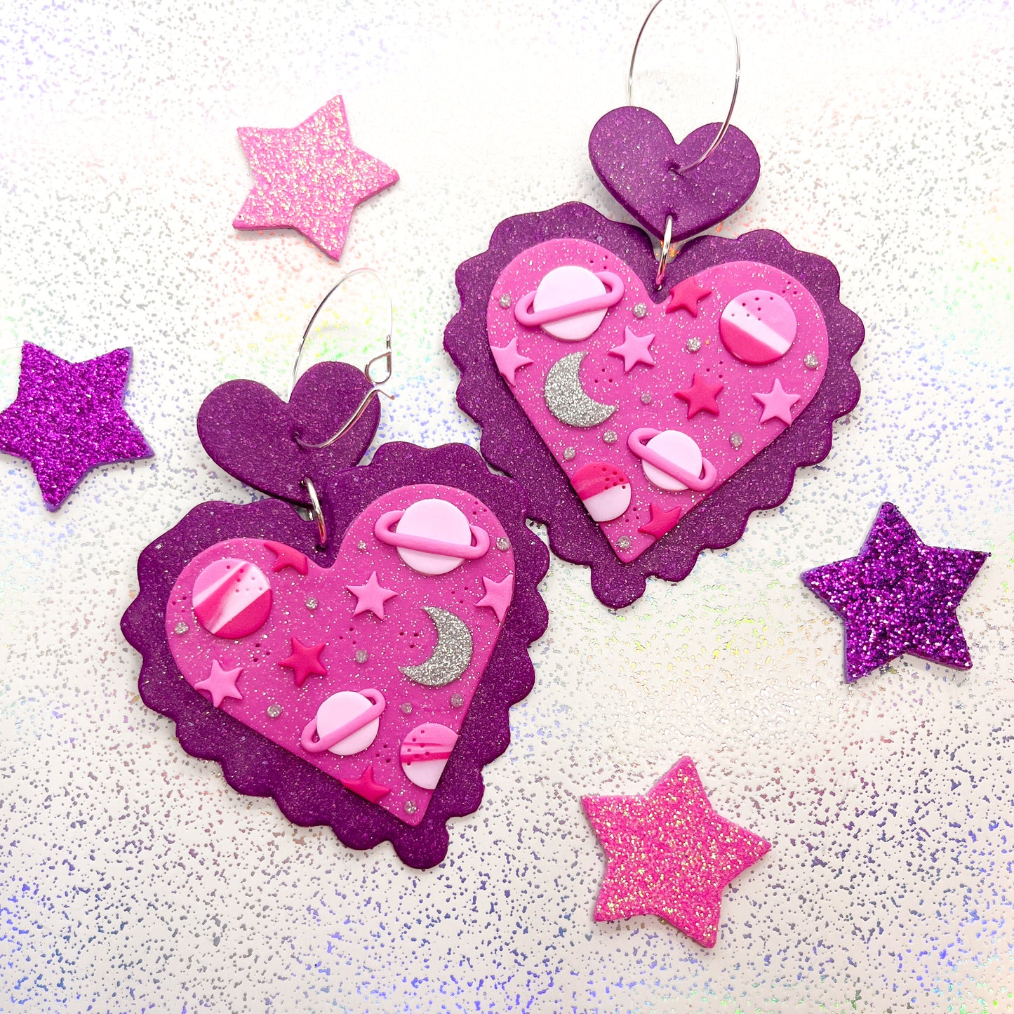 Pink glitter scalloped heart galaxy dangles