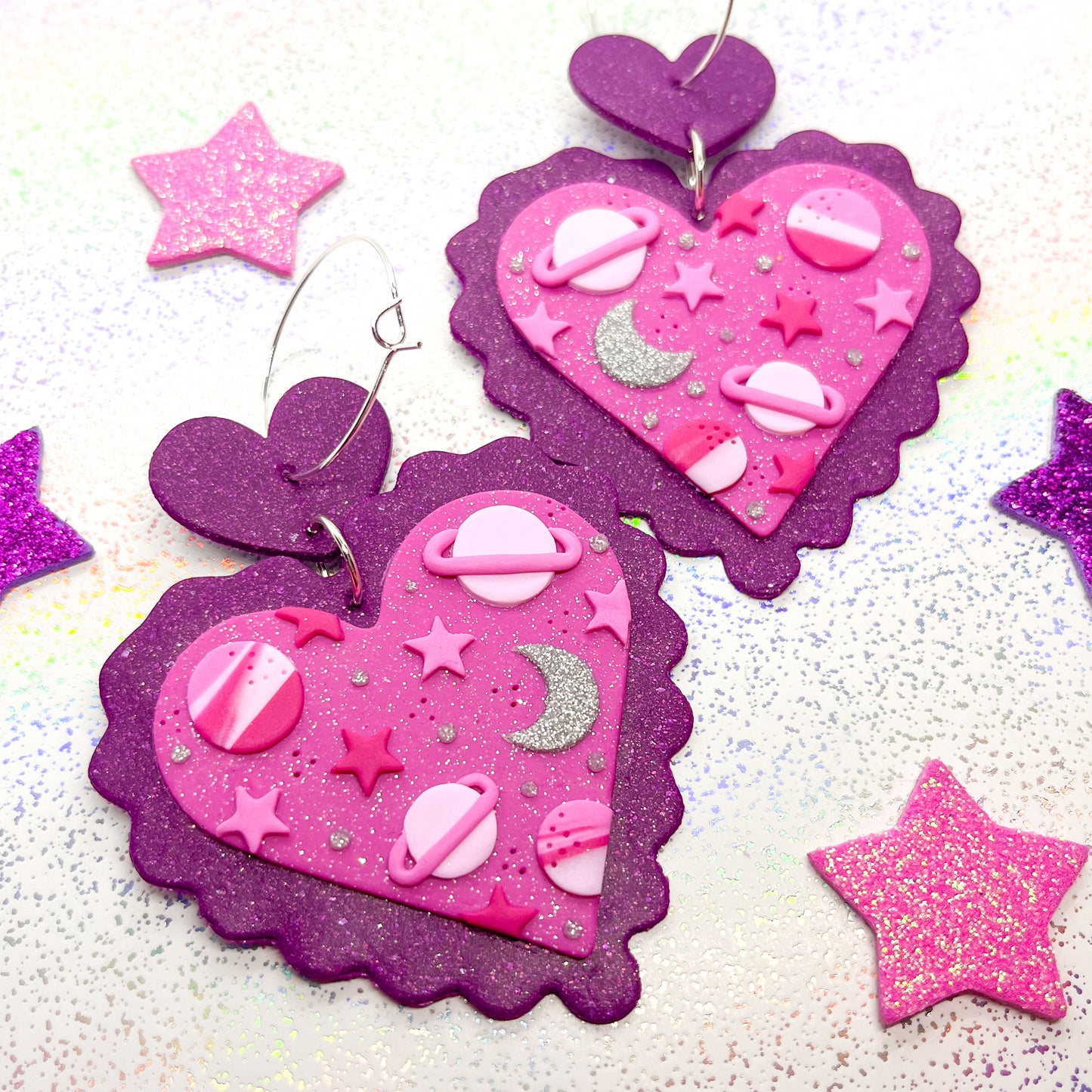 Pink glitter scalloped heart galaxy dangles