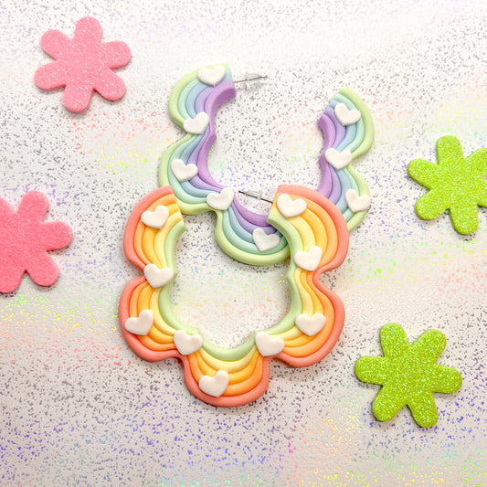 Mismatched rainbow ombre squiggle hoops with white heart details