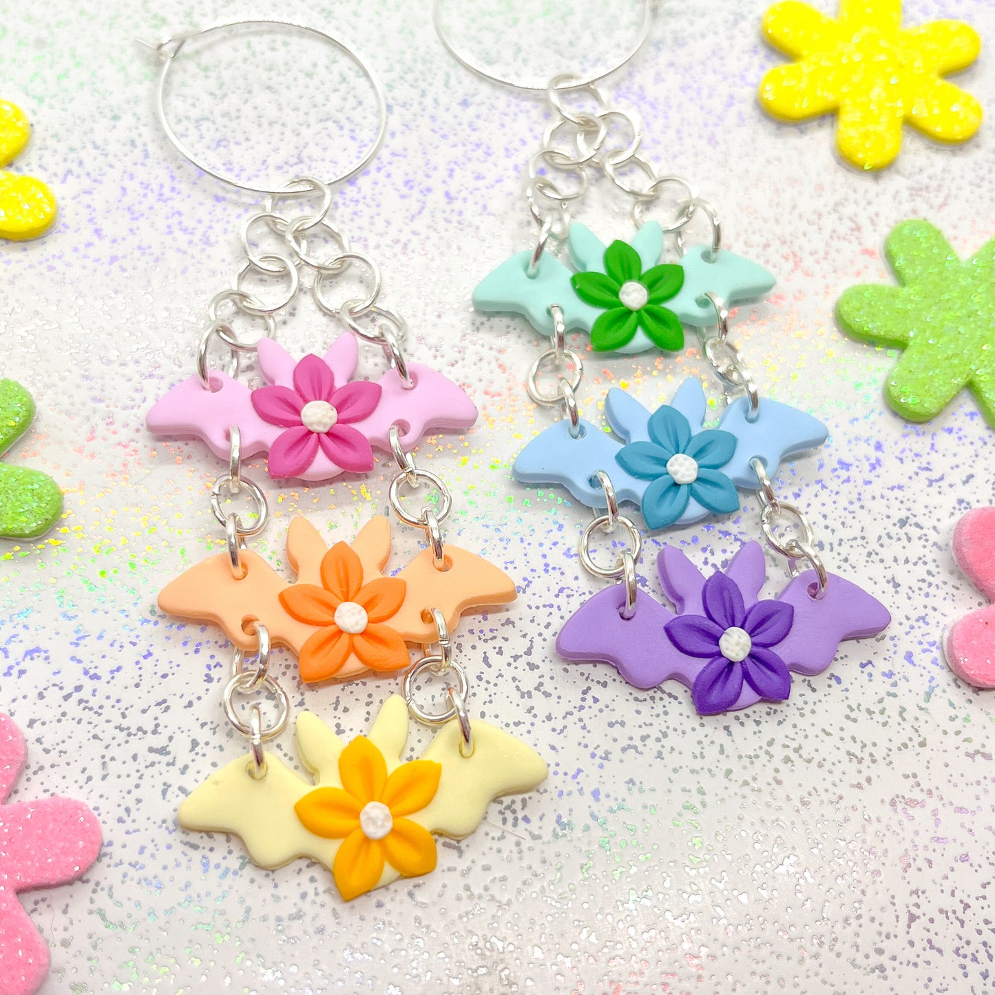 Triple-tiered mismatched pastel rainbow bat dangles