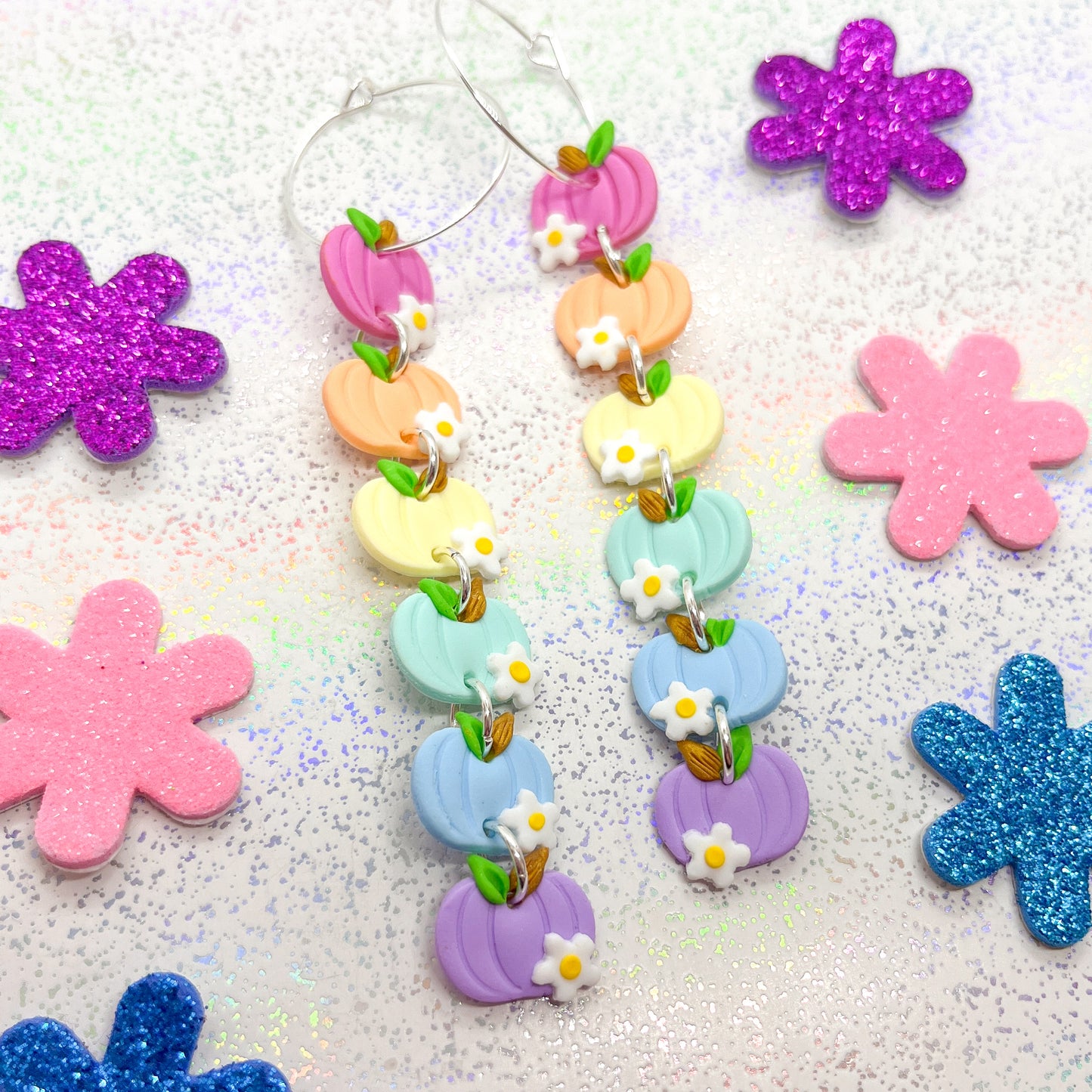 Pastel rainbow pumpkin and daisy dangles