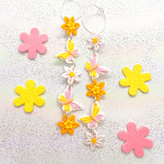 Pastel butterfly and daffodil daisy chain dangles