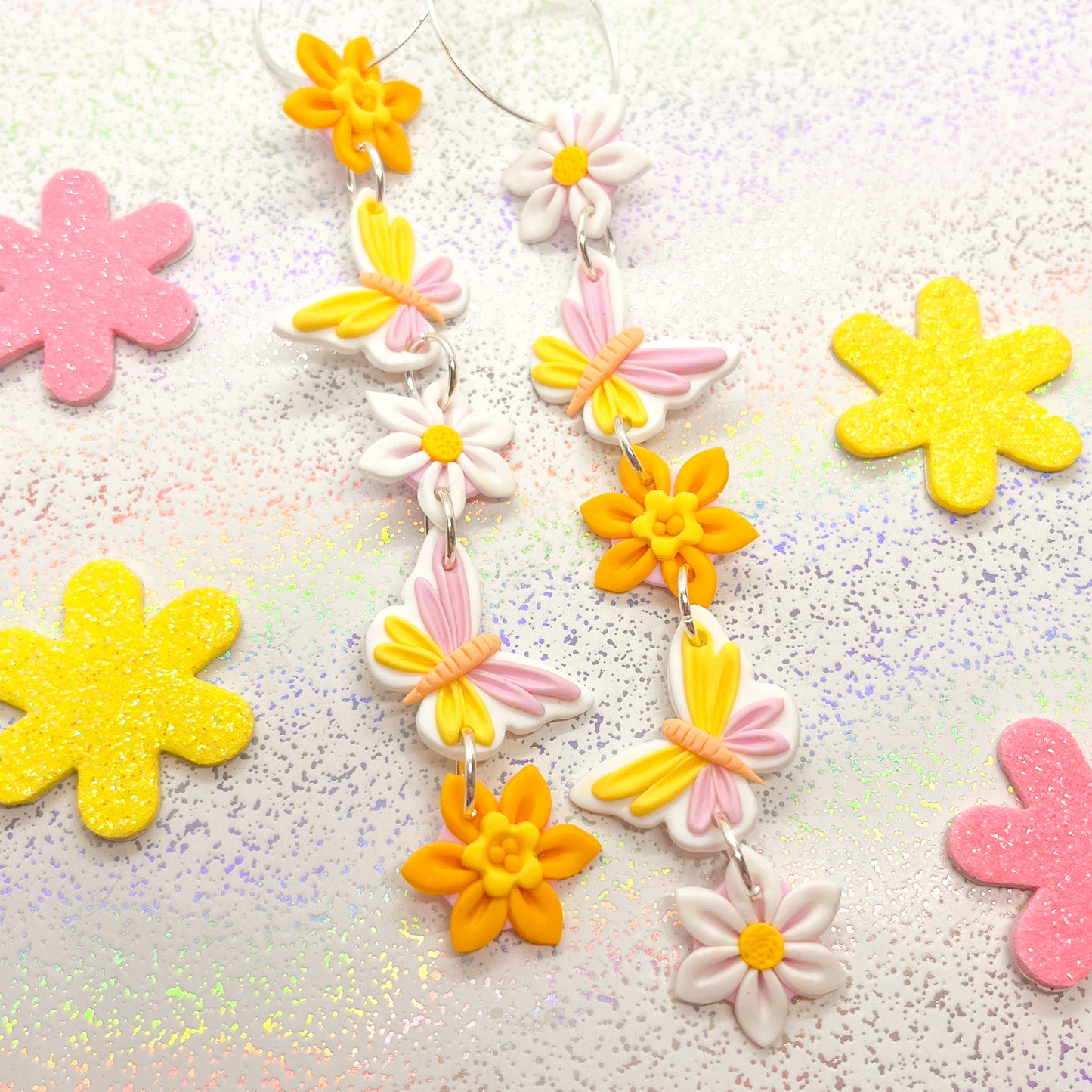 Pastel butterfly and daffodil daisy chain dangles