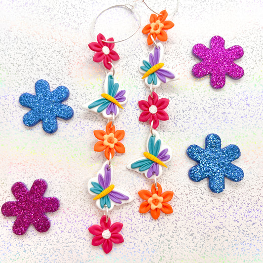 Bright butterfly and daffodil daisy chain dangles