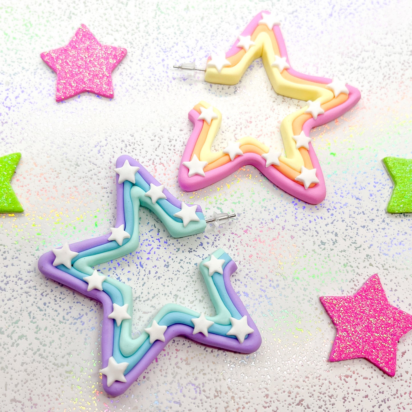 Mismatched pastel rainbow star hoops