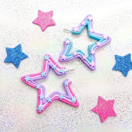 Mismatched pink and blue ombre star hoops