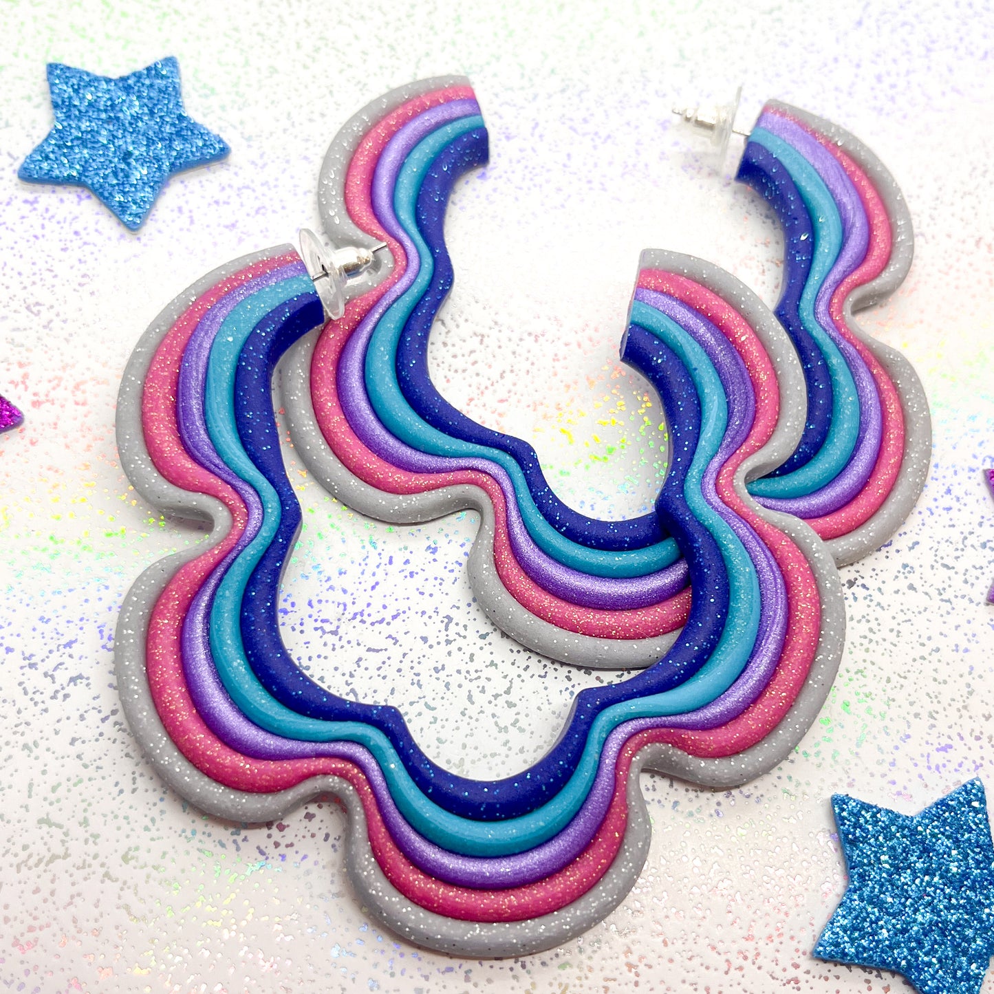 Cosmic glitter squiggle hoops