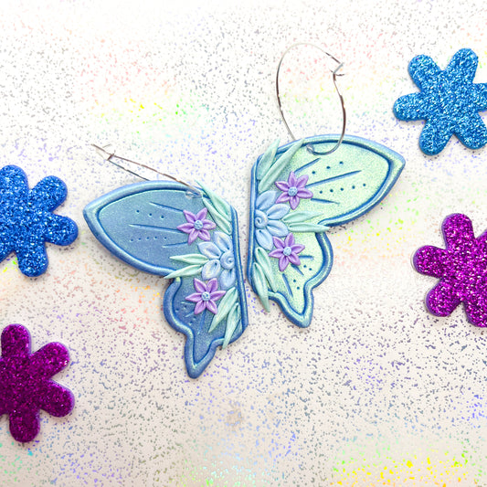 Iridescent blue fairy wing earrings