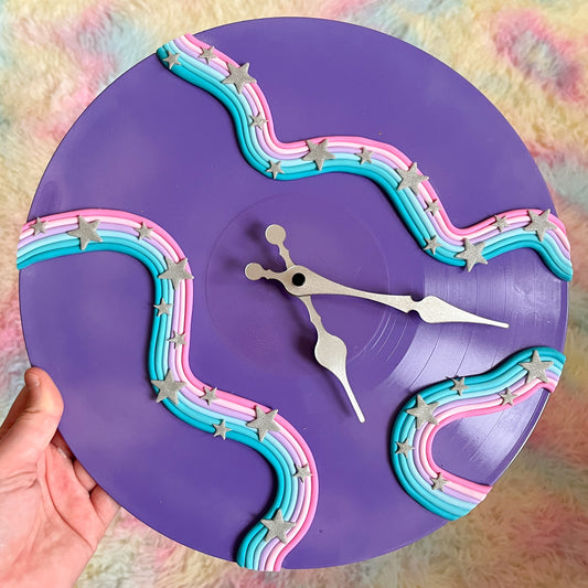 Vivid violet celestial squiggle wall clock