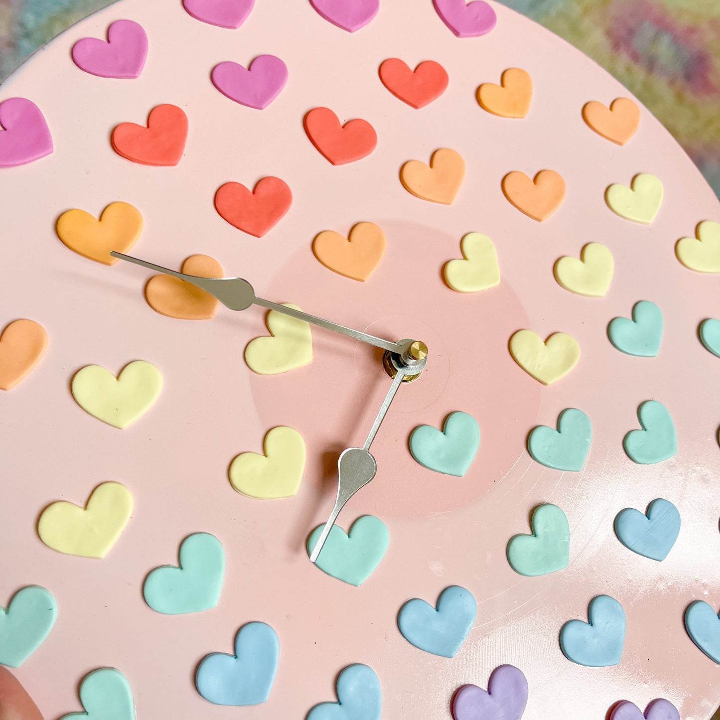 Pastel pink and rainbow heart wall clock