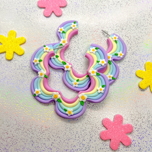 Pastel rainbow squiggle hoops with daisy details