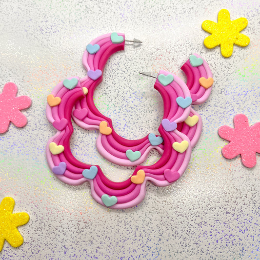 Pink ombre squiggle hoops with rainbow heart details