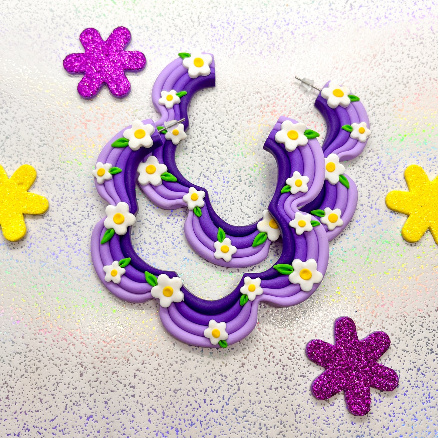 Purple ombre squiggle hoops with daisy details