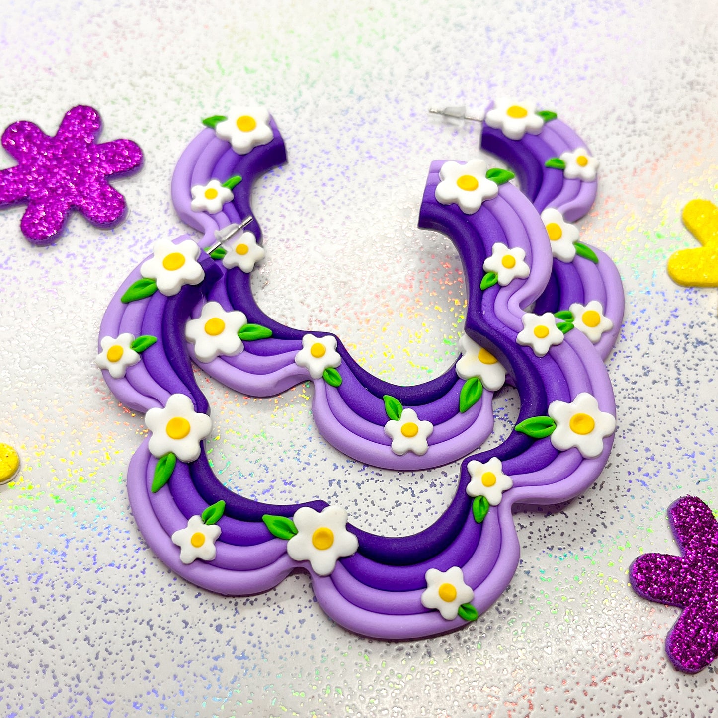 Purple ombre squiggle hoops with daisy details